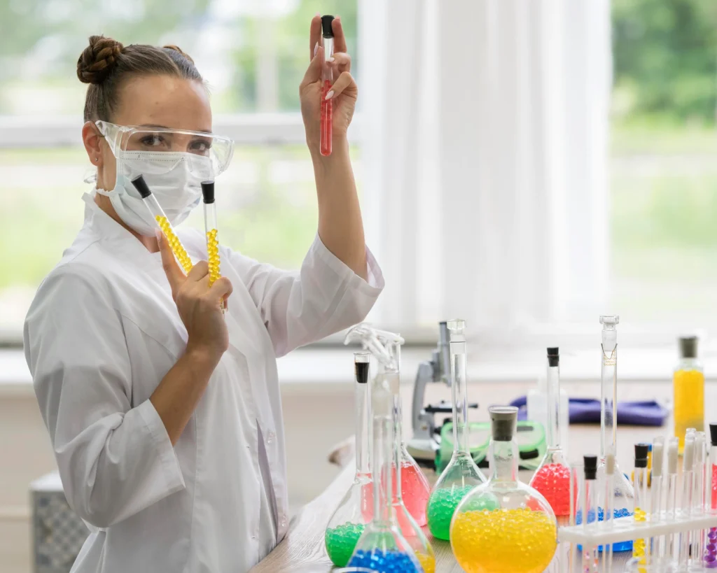 Scientist holding test tubes in a lab